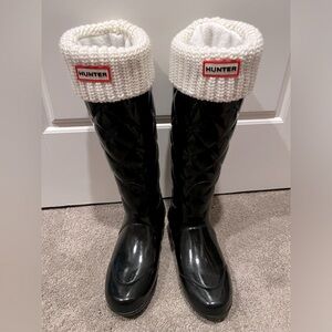 Black patent leather quilted Hunter boots with boot socks
